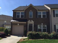 Building Photo - Park South Station Townhome - End Unit COM...