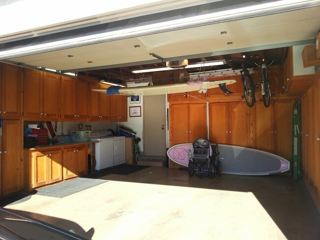 2 car garage: full cabinetry - 10147 Decima Dr