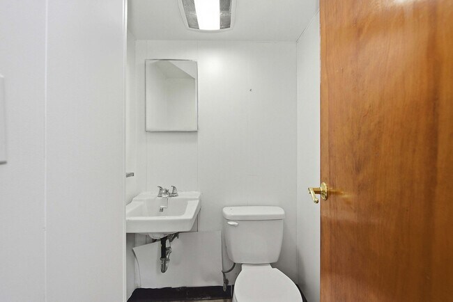 Building Photo - NORWOOD- Cute 2 bedroom 1.5 baths with fenced yard