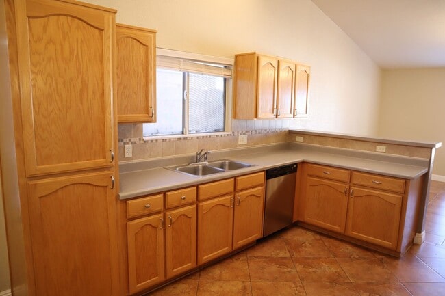 Building Photo - Home With A Pool and Much More!