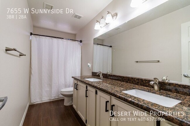 Building Photo - 7655 W Sunnyside Dr