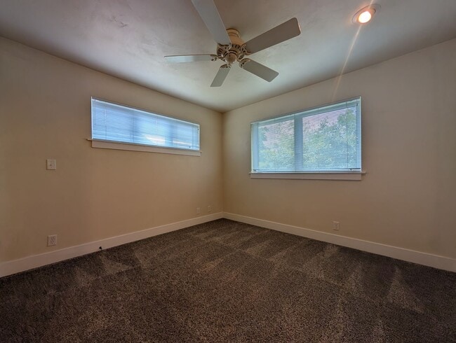 Building Photo - Beautiful 2-Bedroom, 2.5-Bath Condo Near A...