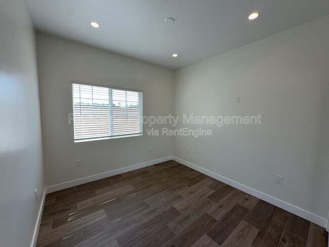Building Photo - 7893 Mango Ave