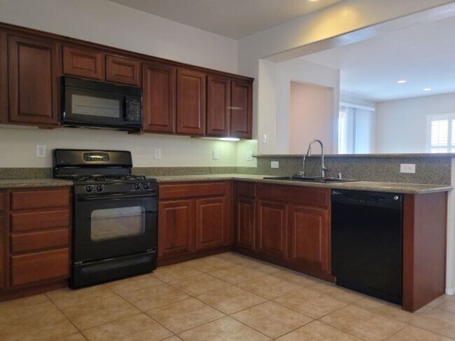 Building Photo - Single story with lots of tile in living a...