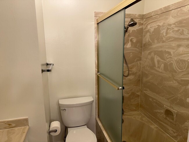 Building Photo - Spacious Millcreek Townhome with Two Living Areas, Private Deck & Community Amenities