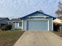 Building Photo - Cute 3 bedroom 2 bath house with new flooring/paint