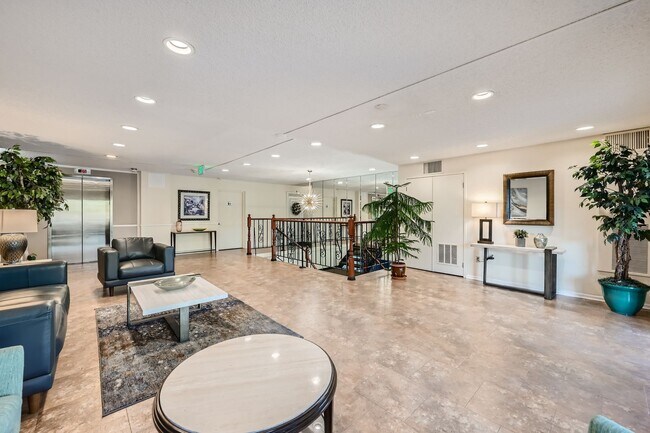 Building Photo - Completely Updated 2 Bedroom 2 Bathroom Condo Available NOW! Garage Parking Included!