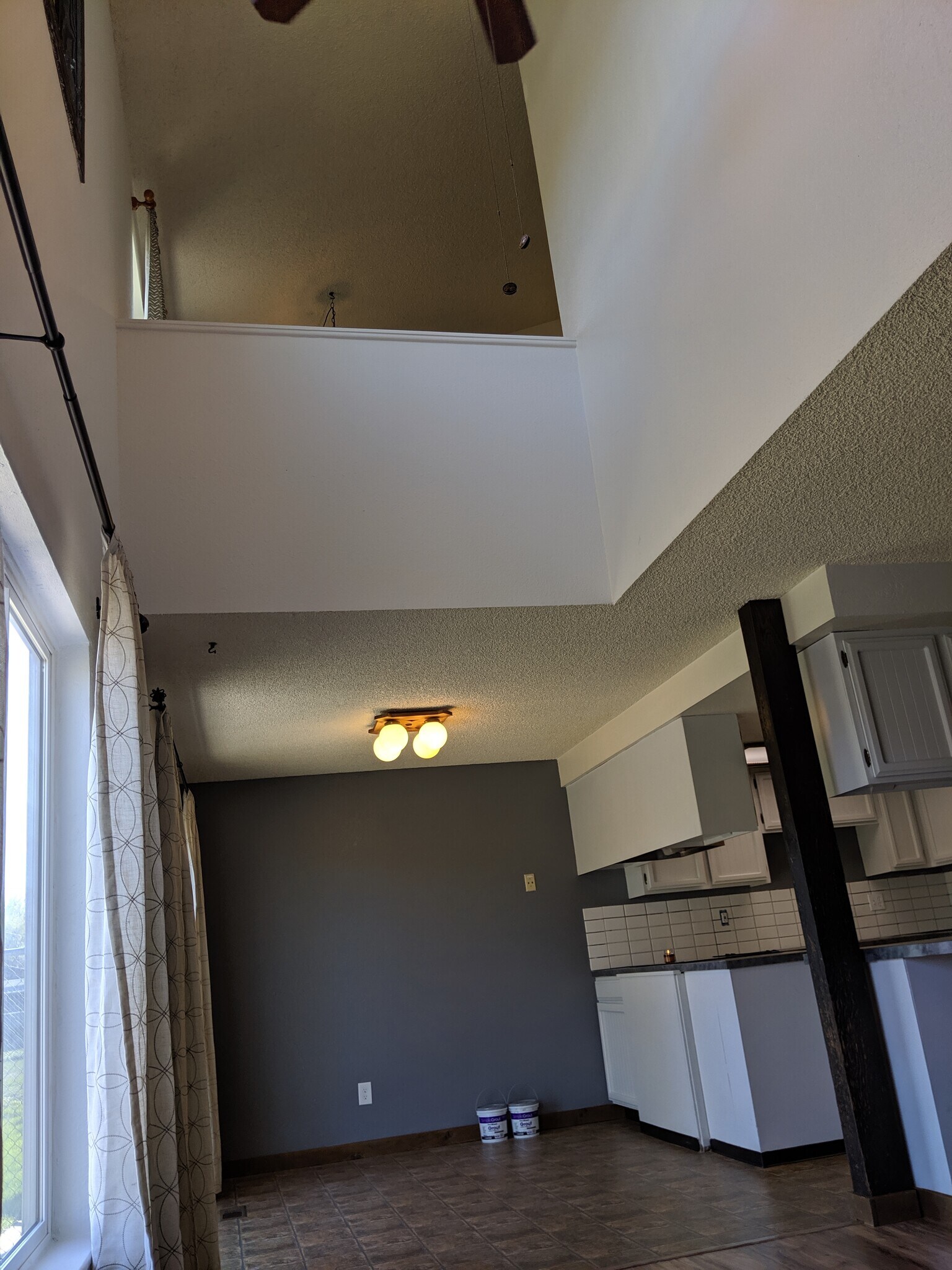 Looking into the dining room, and up to bedroom 1 from the living room. - 2115 Pleasanton St