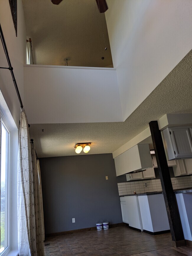 Looking into the dining room, and up to bedroom 1 from the living room. - 2115 Pleasanton St