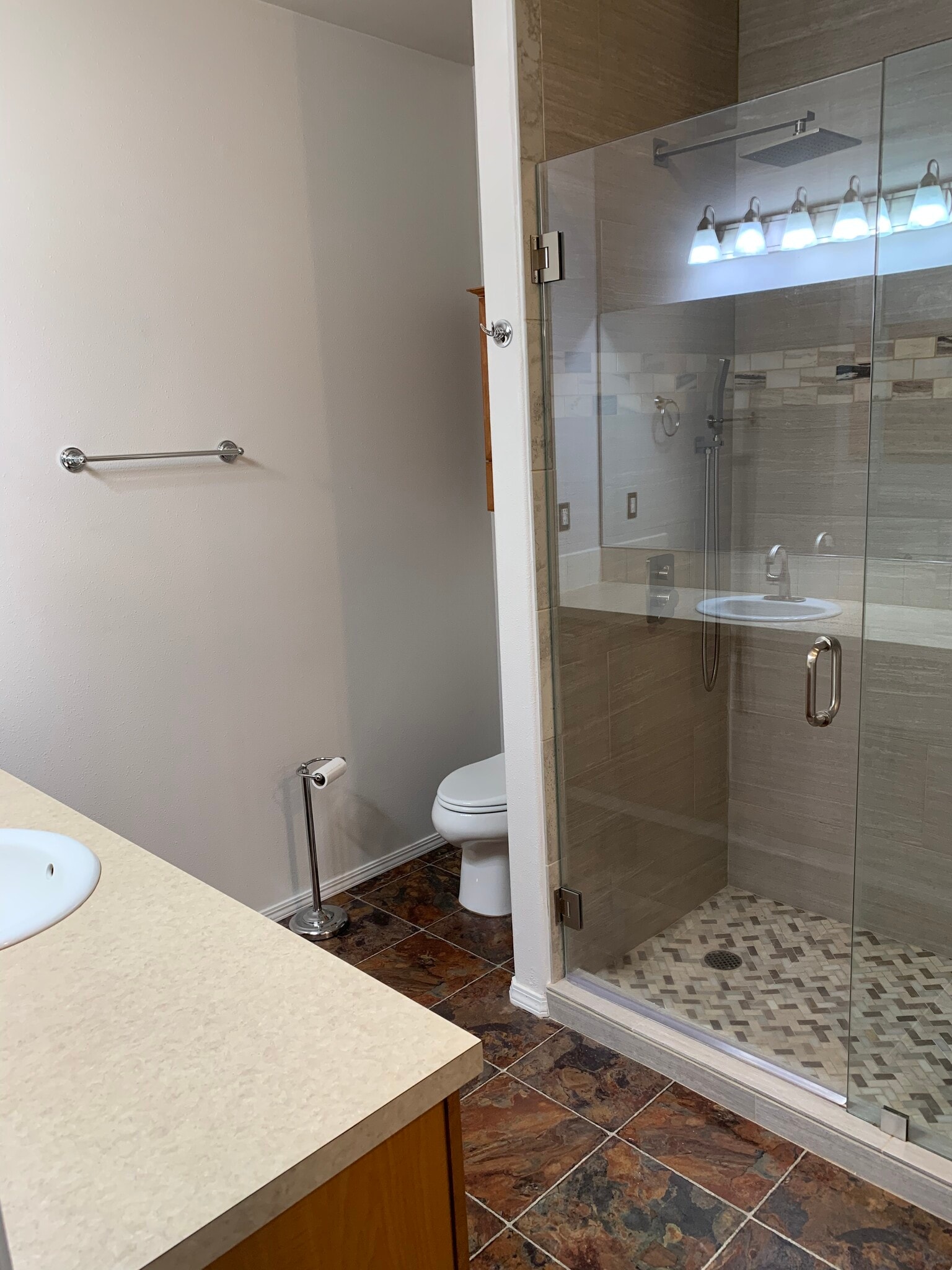 Walk-in tiled shower. - 1661 NE Market Dr