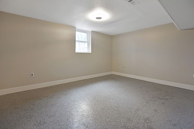 Building Photo - Pet Friendly Three Bedroom with Basement!