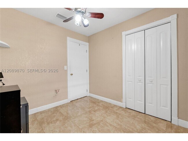 Building Photo - 6049 W 14th Ln