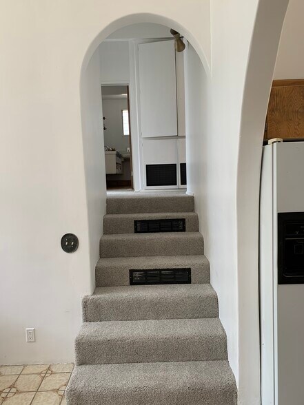 Stairway up to three bedrooms including master - 10458 Pearson Pl