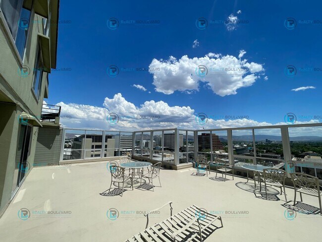Building Photo - Exquisite 1-bedroom, 2-bathroom condo Overlooking the beautiful Truckee River with covered parking!