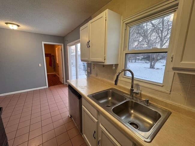 Building Photo - AVAILABLE NOW - Nicely rehabbed 3 Bedroom Single Family Home with Garage and Very Large Backyard