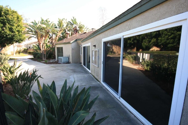 Building Photo - MOVE-IN READY - SPACIOUS 2-BEDROOM TOWNHOM...