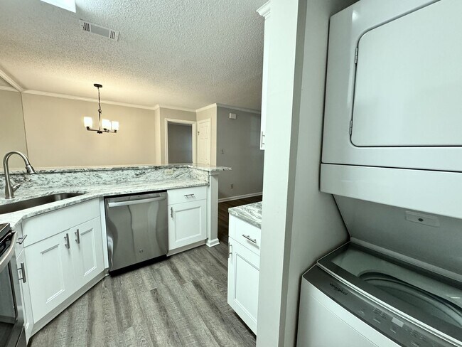 Building Photo - Updated 1st Floor/1-Level Condo Available NOW & Rent Includes Water, Sewer, Trash, Landscaping, F...