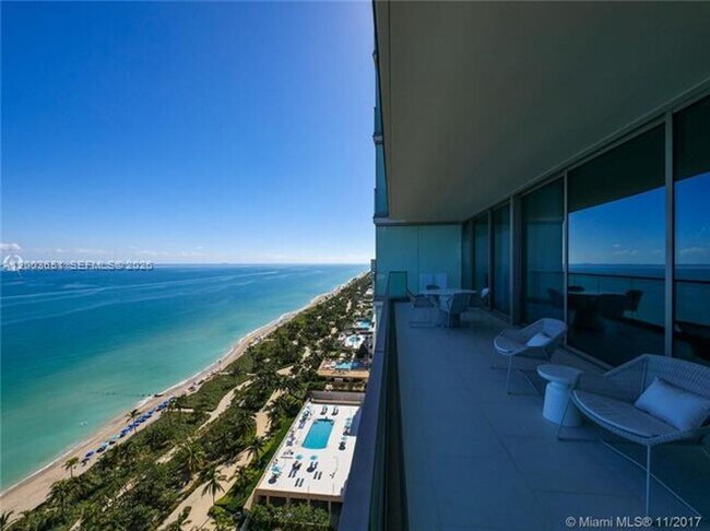 Building Photo - 10201 Collins Ave