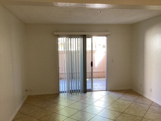 Building Photo - Downstairs Condo Located in the Gated Community of Las Palmas