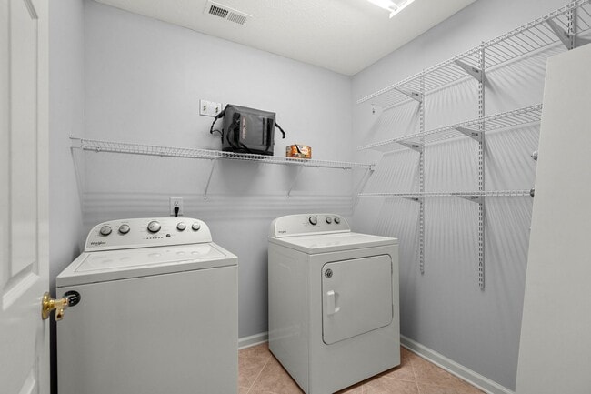 Building Photo - Live the Coastal Lifestyle in This Cypress Keys Beauty!