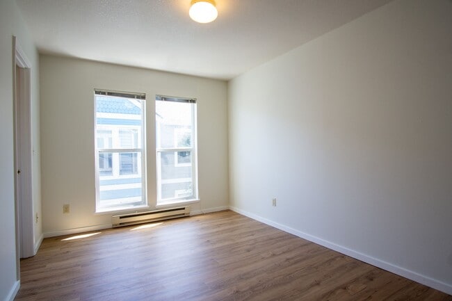 Building Photo - Major Updates: Vaulted Ceiling Spacious 2-Bed 2-Bath w DW, WD, Balcony!