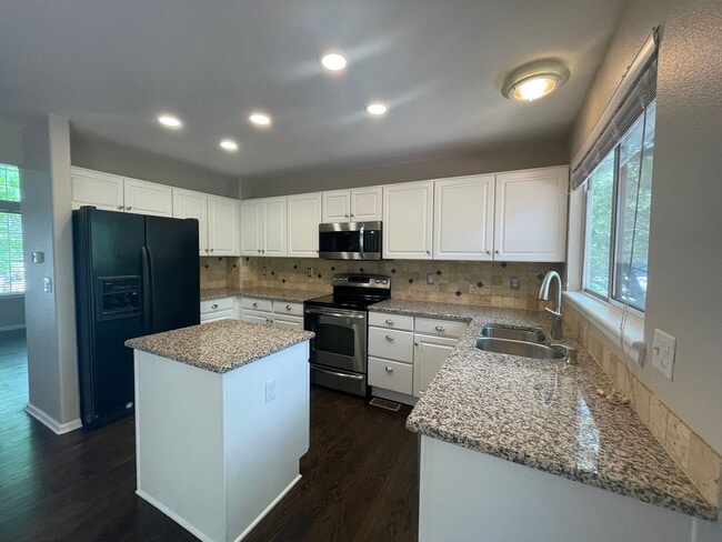 Building Photo - Beautiful and Fresh Updated Four Bedroom Home on a Corner Lot in Rock Creek!