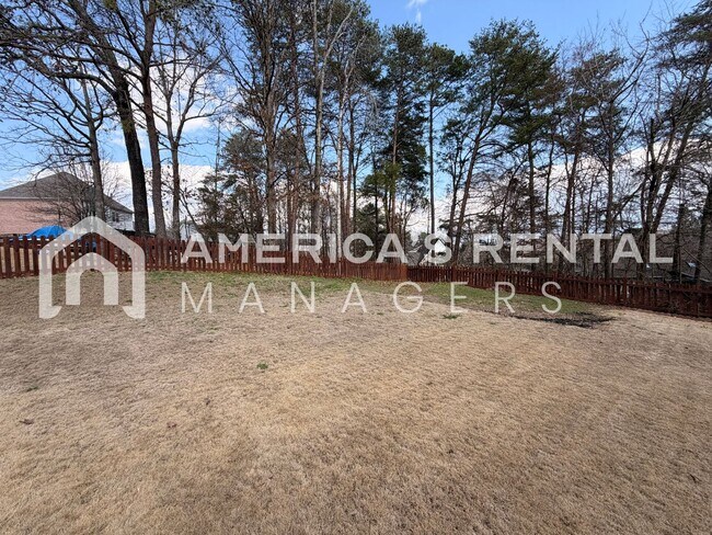 Building Photo - JUST LISTED - Spacious Five Bedroom Residence in Meadowbrook!