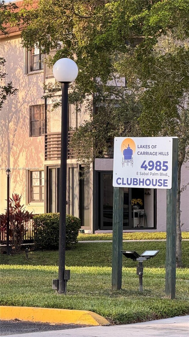 Building Photo - 6090 N Sabal Palm Blvd