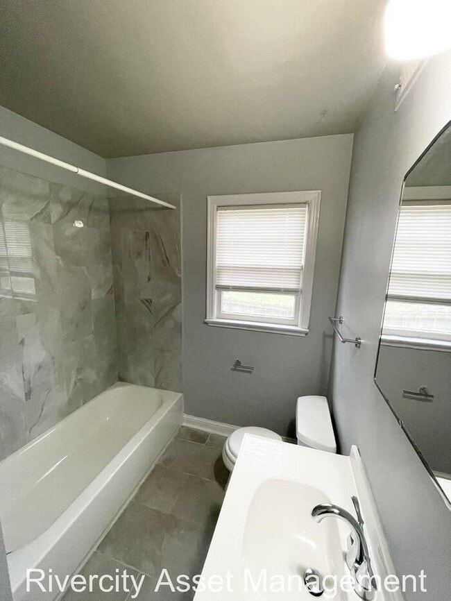 Building Photo - A Must See Duplex, Comes With New Fridge!!!!!