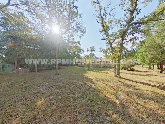 Building Photo - Move-In Special | Charming 3-Bedroom Corner Lot Home with Spacious Backyard and Convenient Location