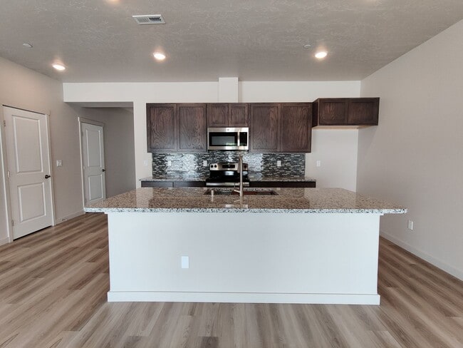 Building Photo - Updated Two-Story Home with Island Kitchen...