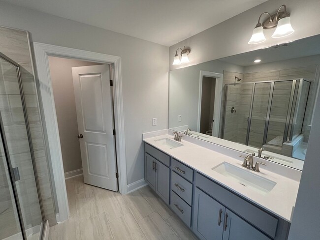 Building Photo - Newly Built 4BD, 3BA Cary Townhome with Modern Amenities and Screened-In Patio