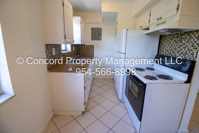 Building Photo - ASK ABOUT OUR SPECIALS! 2/1.5 Townhouse St...