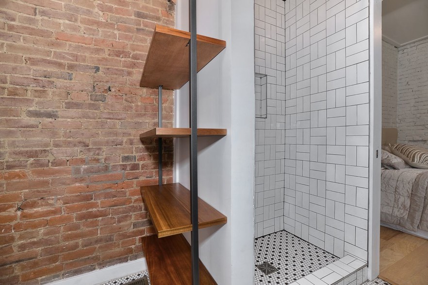 Tiled shower + CB2 linen shelves - 1713 Locust St