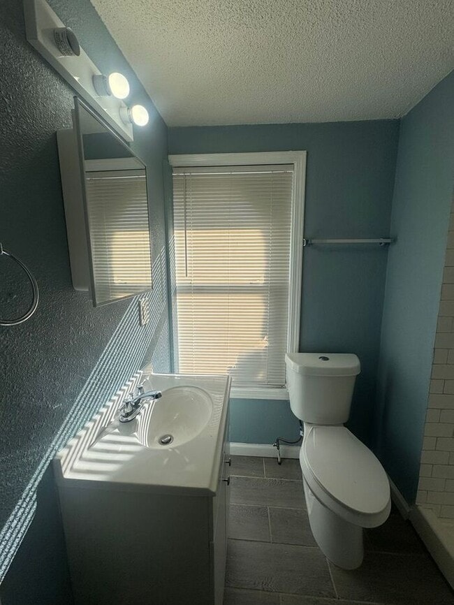 Building Photo - Charming 3BR 2BA Home w/ Fenced Yard + Covered Porch in KC