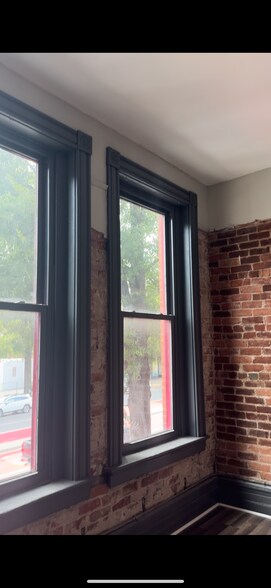 Spacious bedroom with large windows - 404 W Broad St