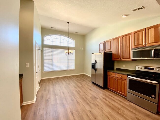 Building Photo - READY July 1st!! End-Unit Condo with Commu...