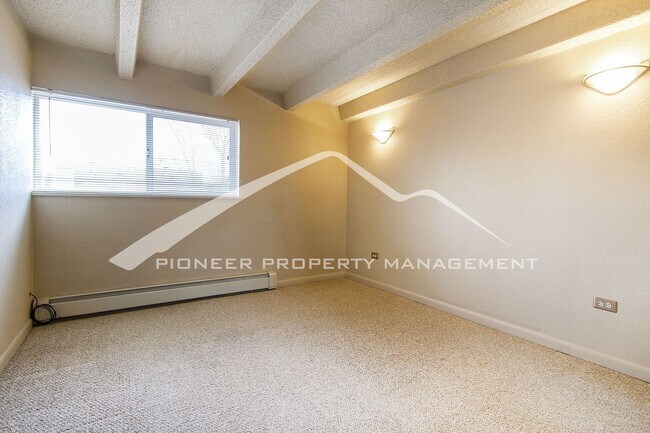 Building Photo - Cozy Condo with Assigned Parking Spot and Balcony