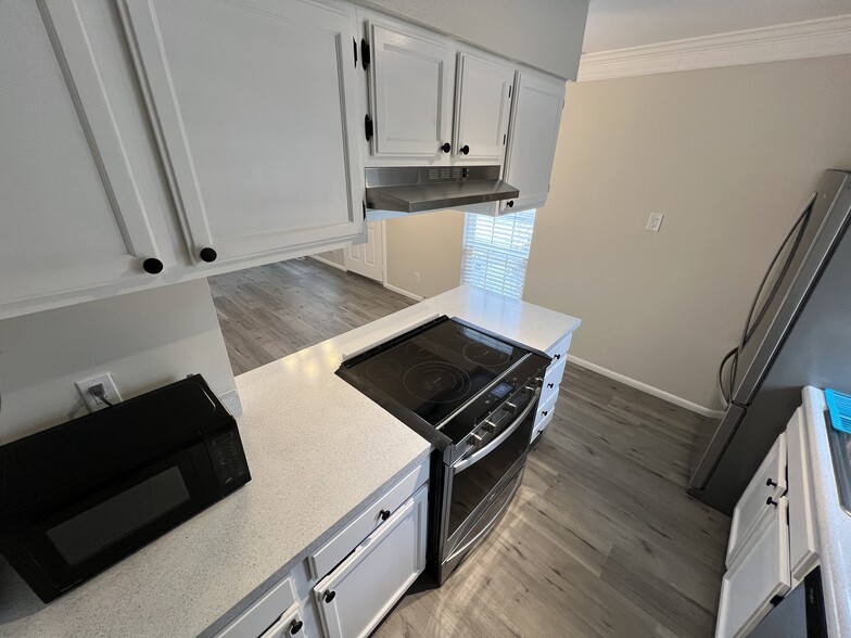 Galley kitchen - new glass cooktop and air fry oven - 6650 E Arizona Ave