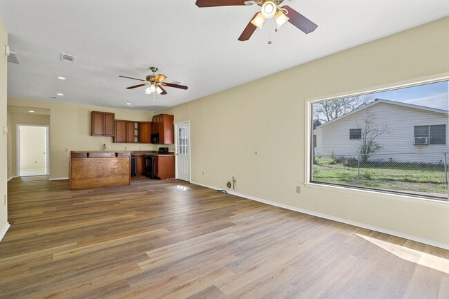 Building Photo - White picket fence cottage, ready to be your next home!