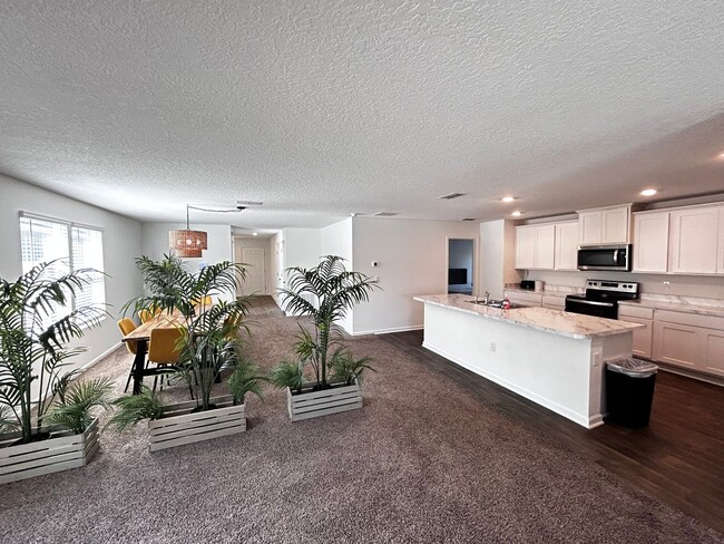 Building Photo - Picturesque Waterfront 4-Bedroom Home with...