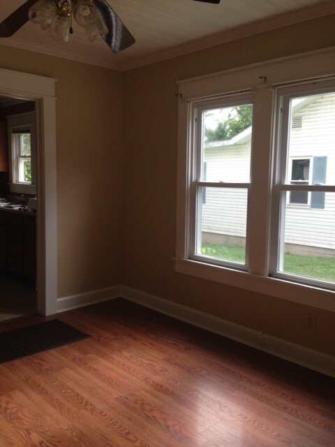 Living room looking into kitchen - 212 E Vermilya Ave