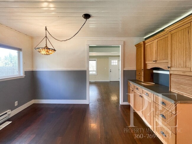 Building Photo - Whimsical Craftsman with Wraparound Porch, Bonus Room & Liberty Bay Peek Views