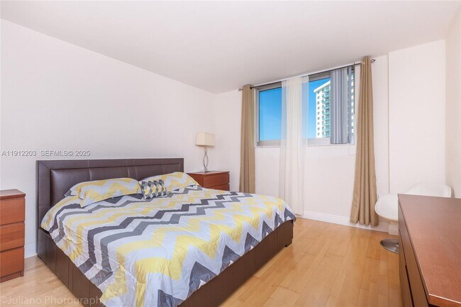 Building Photo - 19380 Collins Ave