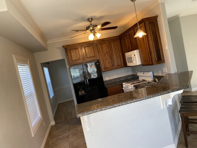 Kitchen with appliances - 606 South A Ave.