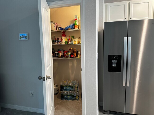 Building Photo - Resort Style Living! Stunning 3/2.5 Townhome in Waterleigh! Available April!