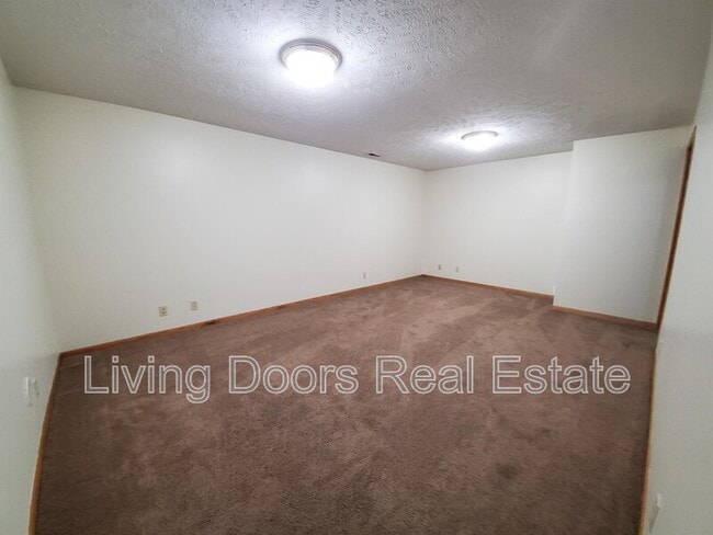 Building Photo - 6441 Whitewater Ln