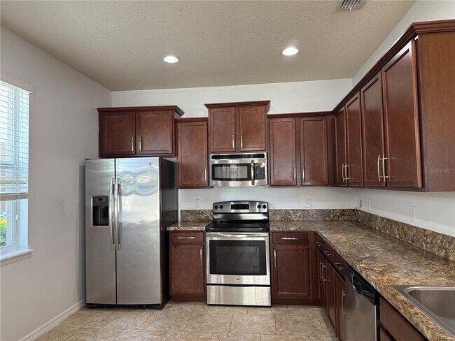 Building Photo - 6568 S Goldenrod Rd