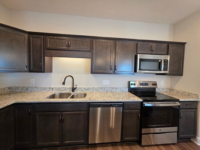 Building Photo - Live Where Comfort Meets Convenience in This Stylish 3 Bedroom Townhome