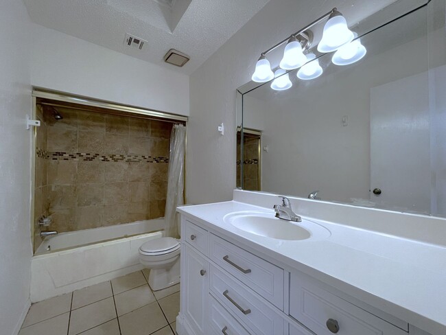 Building Photo - Welcome to this charming two-story single-...